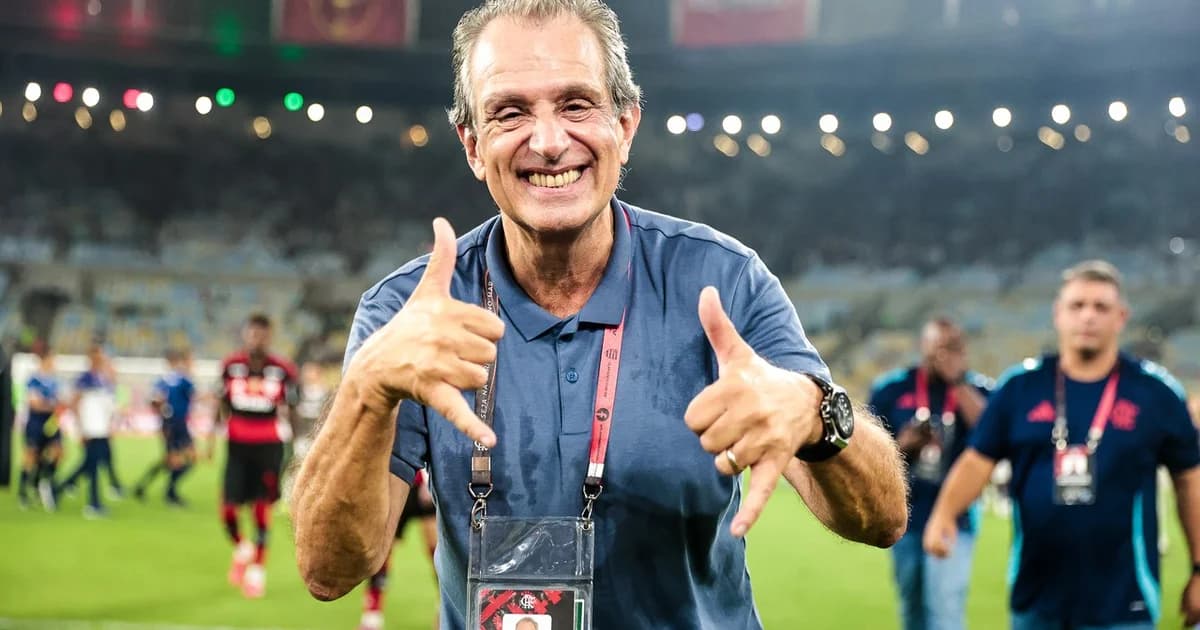 Executivos apertam mãos sobre contrato de direitos de transmissão em estádio lotado, com câmeras, placar '2026–2029' e gráfico de audiência.