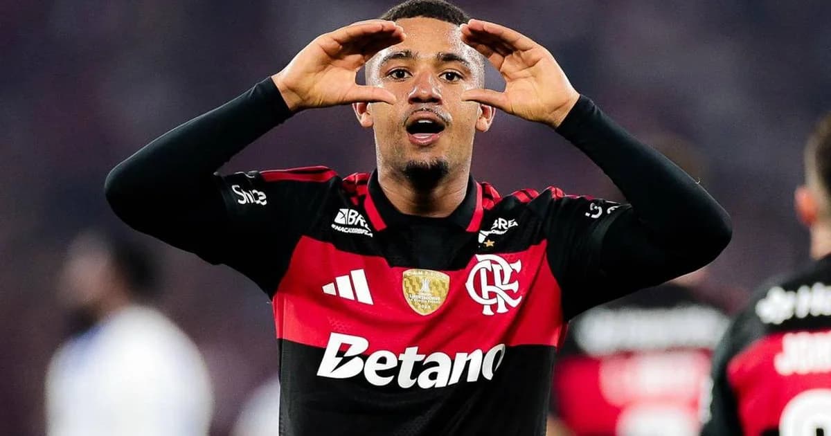 Atacante marca gol decisivo na Libertadores; torcida vibra em estádio lotado sob refletores e fumaça