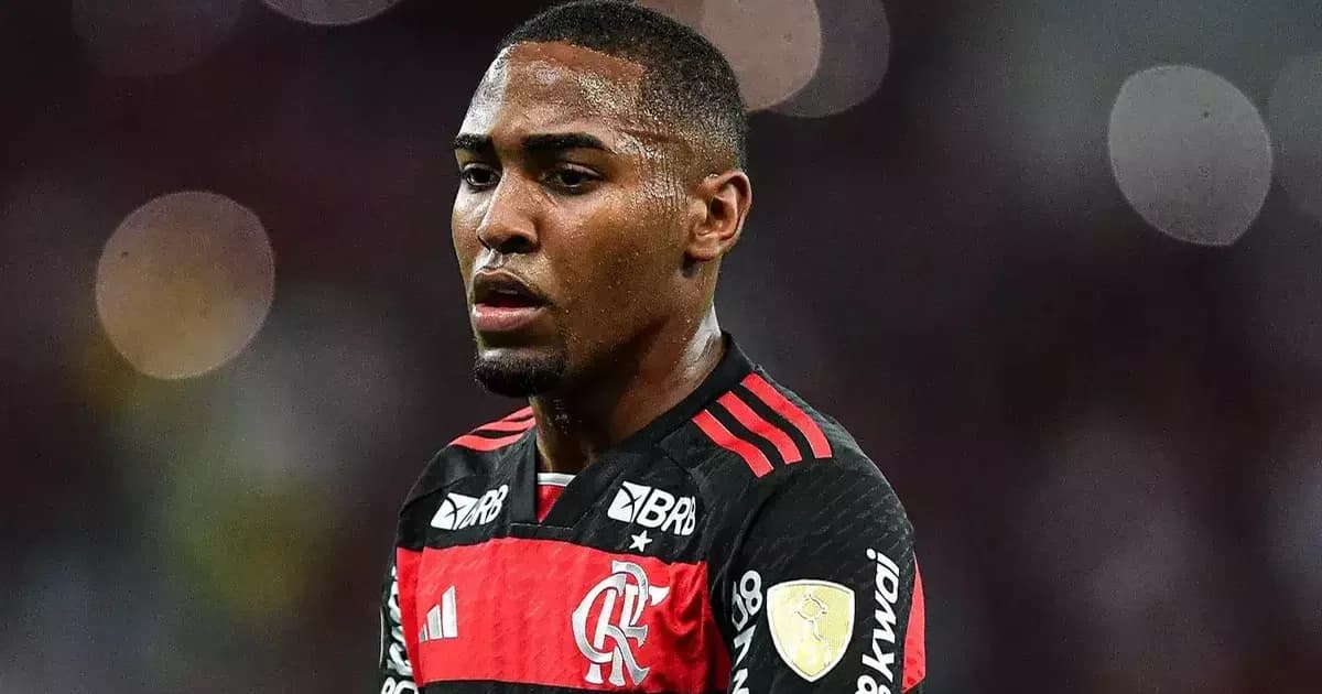 Túnel do estádio do Flamengo com camisa sem marca, pasta de transferências e silhueta saindo — negociação, saída e ajustes no elenco.