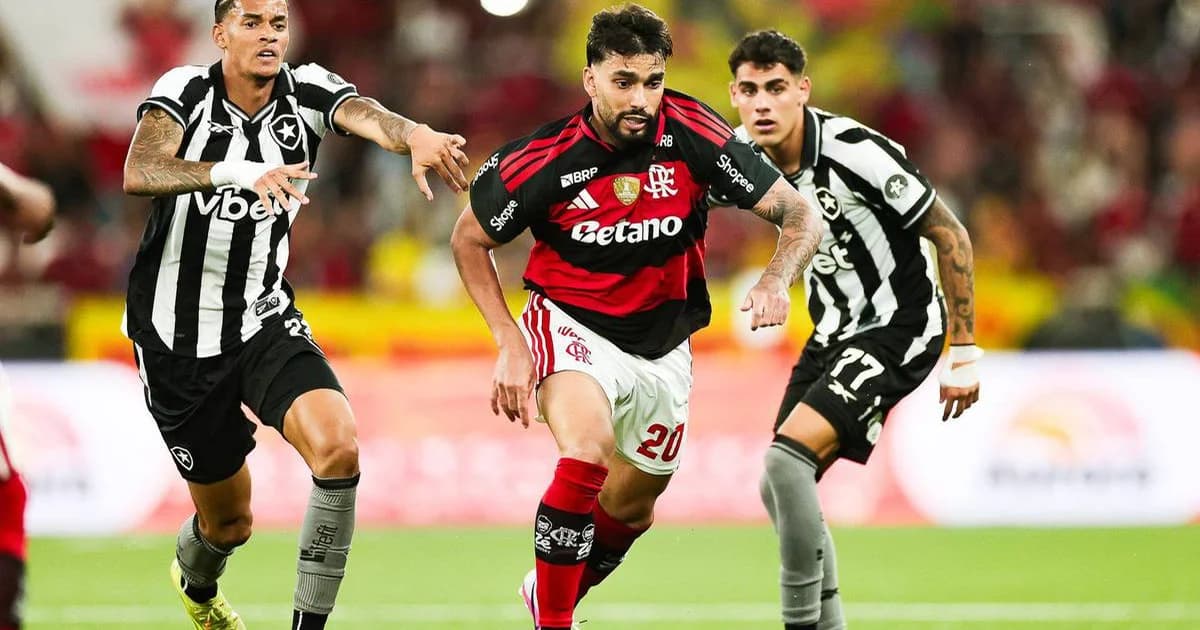 Maracanã lotado com quase 60 mil torcedores, clima decisivo do clássico, torcida vibrando em vermelho, branco e preto