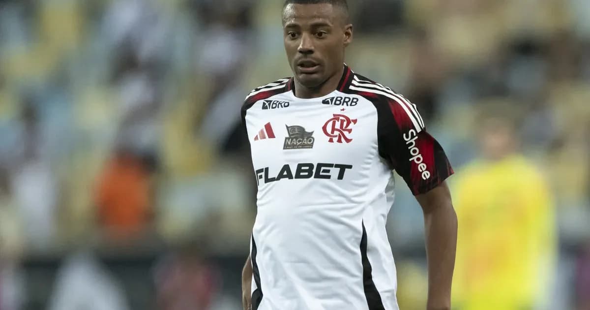 Volante solitário em estádio ao entardecer, placar mostra 1946→607 minutos (-69%), atmosfera de transferência e empréstimo