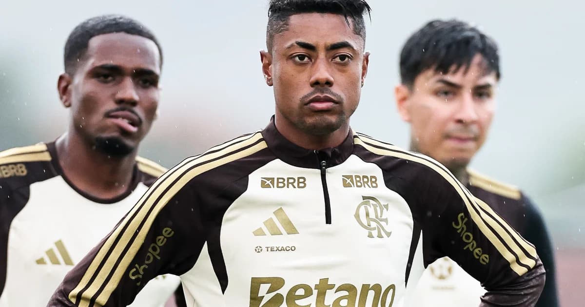 Bruno Henrique em impasse salarial: jogador de camisa 27 sozinho no gramado, estádio vazio e clima tenso com diretoria distante.