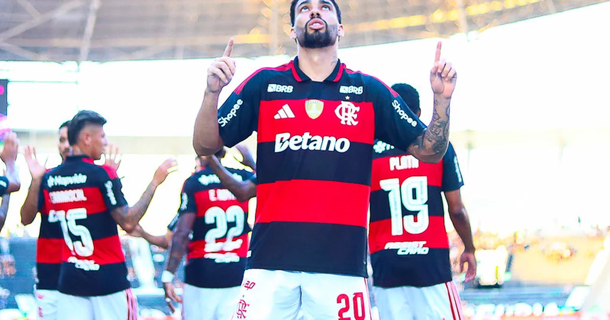 Estádio dividido: lado luxuoso simboliza Flamengo e lado modesto representa Lanús, retratando abismo financeiro antes da Recopa.