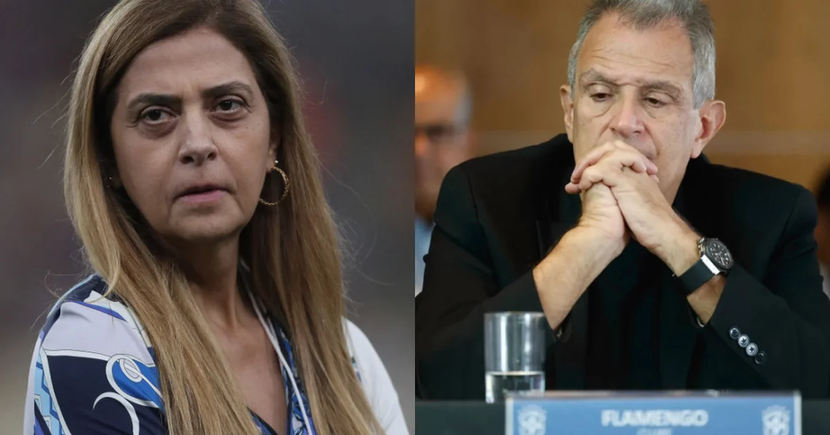 Estádio dividido, torcida contrastante e diretores passando contrato com símbolo '3%', representando racha na Libra e no Campeonato Brasileiro.