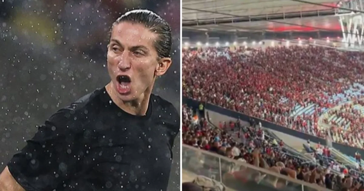 Torcida do Flamengo no Maracanã vaiando o técnico após derrota na Recopa, arquibancadas em vermelho e preto e fumaça de sinalizadores.